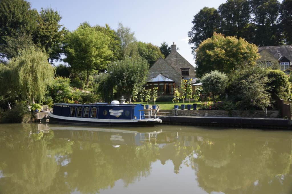 Canalboat on Oxford Canal with canopied open deck