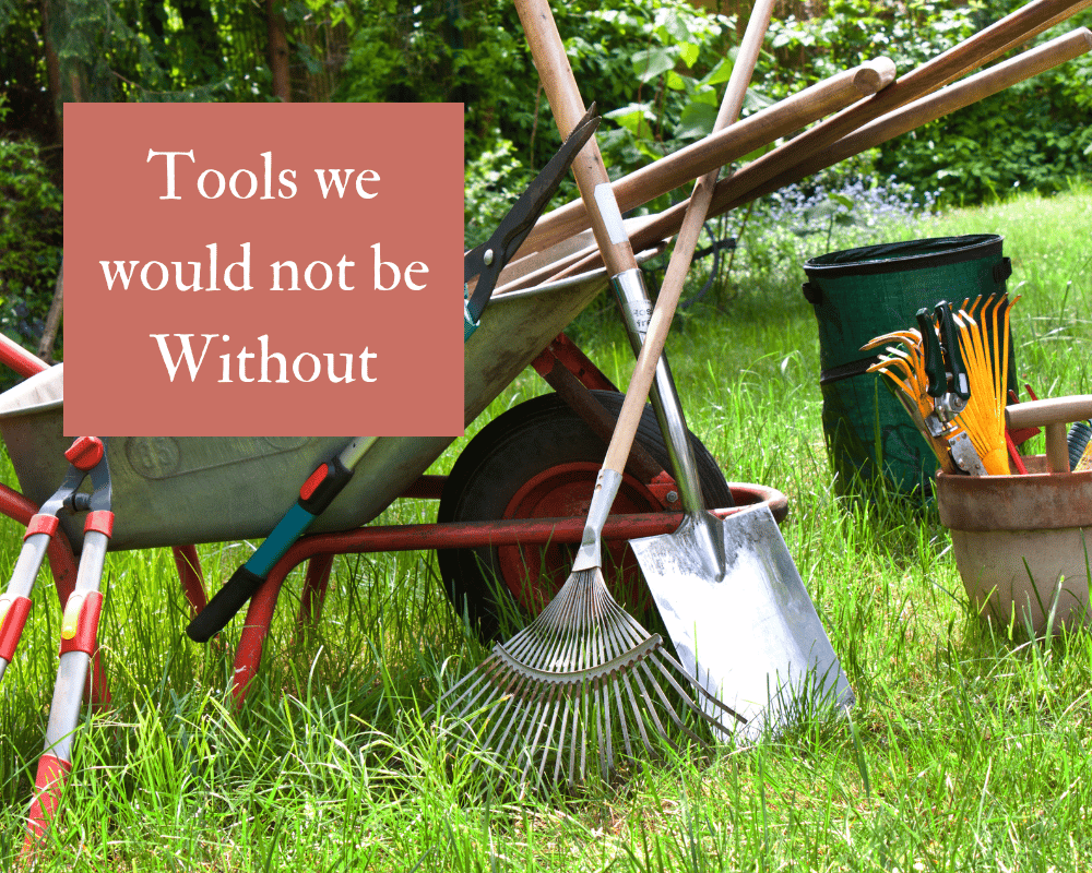 A collection of garden tools with wheelbarrow