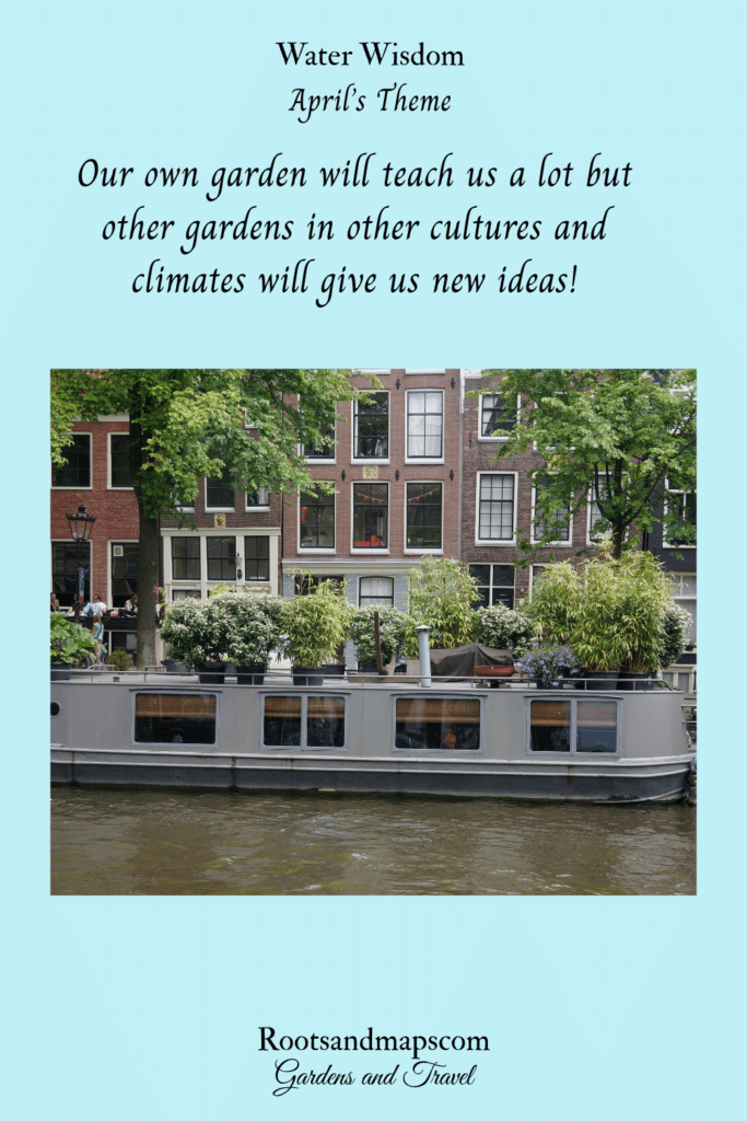 Flowers covering the top of a houseboat moored in a canal