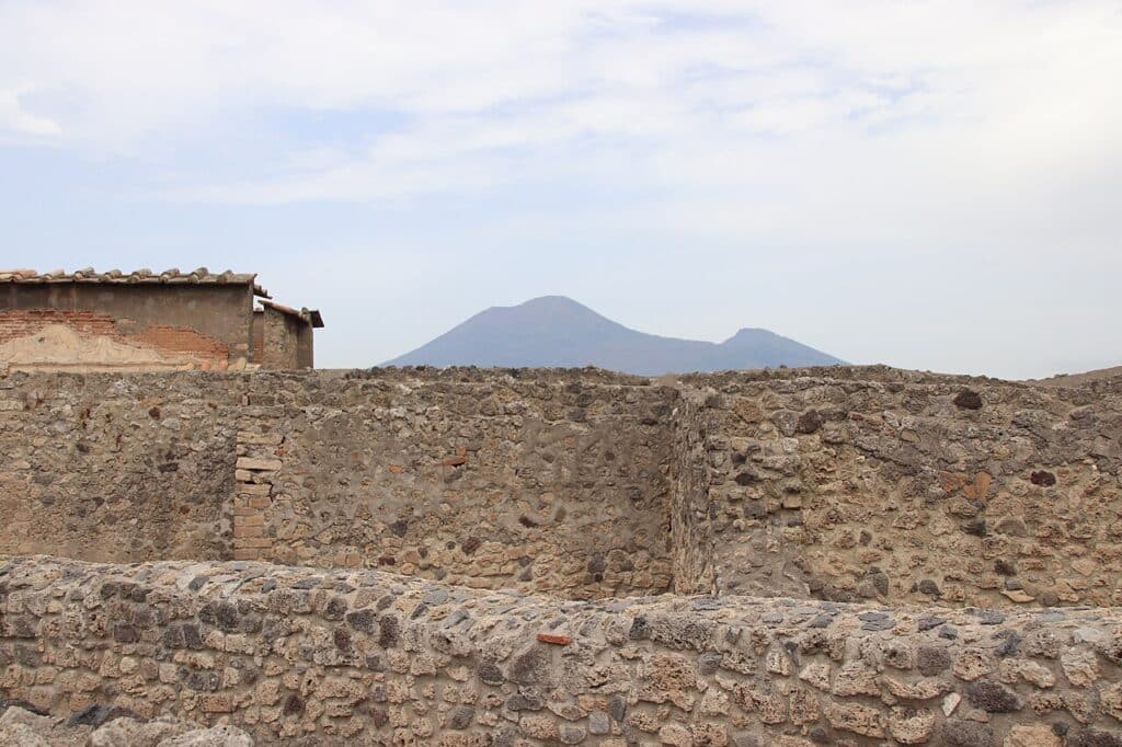 Mount Vesuvius rising behind Pompeii ruins